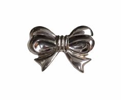 "The past will always return in the fashion world and this piece is back for round two! In the 1920's ladies of class wore the most opulent dresses with jewelry to match. As the years continued, jewelry makers tailored pieces to fashion and trends which resulted in affordability for style. Presenting this Beautiful Vintage Sterling Silver Puffy Ribbon Bow Designer Brooch Pin Featuring Classical Whimsical Designs. Approximate Size: 1 7/8\" High by 2 5/8\" Wide. Don't forget to LIKE ☑️ us on Faceb Elegant Silver Brooches For Vintage Events, Classic Evening Brooch, Retro Silver Brooches For Formal Occasions, Vintage Jewelry With Decorative Bow For Formal Occasions, Silver Retro Brooches For Formal Occasions, Elegant Silver Jewelry With Bow Detail, Vintage Formal Jewelry With Decorative Bow, Silver Brooch With Bow For Formal Occasions, Vintage Brooches With Decorative Bow For Evening