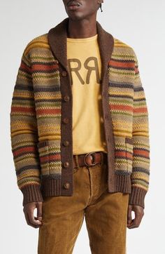 This shawl-collar cardigan is knit from cozy wool yarn in chunky mixed-stitched stripes inspired by an equestrian blanket from the 1940s. The warm autumnal hues remind us of the gorgeous symphony of leaves drifting from the trees. 25" length (size Medium) Front button closure Shawl collar Long sleeves Ribbed cuffs and hem Front button-patch pockets 100% wool Hand wash, dry flat Imported Designer Clothing Double Rl, Striped Shawl, Designer Clothing Brands, Shawl Collar Cardigan, Shawl Cardigan, Merino Wool Cardigan, Collar Cardigan, Short Sleeve Cardigan, Mens Casual Outfits