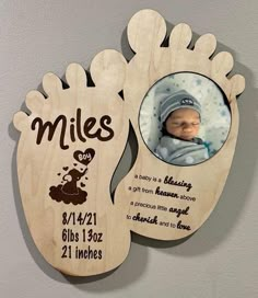 a baby's feet with a photo on it and the words miles printed on them