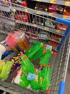 a shopping cart filled with lots of candy