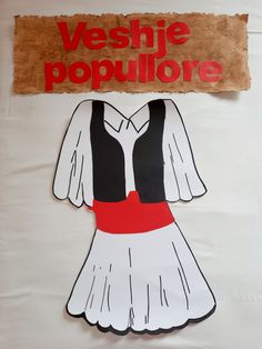 a paper cut out of a woman's dress with the words versie populiore on it