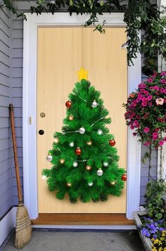 a decorated christmas tree on the front door