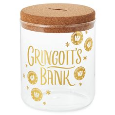 a glass jar with a cork lid that says gringott's bank