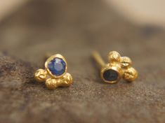 "24k sapphire studs//24k gold earrings//24k gold blue sapphire//gold stud earrings//24k gold earrings//artisan 24k studs//boho artisan studs post is made with 20k gold Once made I just couldn't take my eyes off. They do have an ancient look , so I couldn't be happier . These studs are wonderful as a gift, for someone you love, or for yourself. They are suitable for every occasion, for the day, or for the evening. Last forever and only gets more beautiful with time. you can choose the 2/8 tiny de Boho Stud Earrings, Gemstone Earrings Studs, Classic 14k Gold Gemstone Earrings, Gold Stud, Gold Sapphire Jewelry With Polished Finish, Rustic Gold Jewelry, Gold Gem Earring Stud, Gold Stud Earrings, Blue Gemstone Earrings In 14k Gold