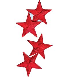 three red stars are in the air on a white background