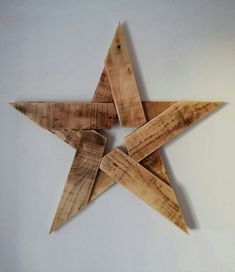 the wooden star is made from several pieces of wood