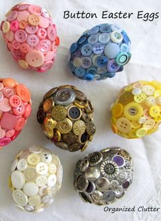 six buttons are arranged in the shape of eggs on a white tablecloth with text that reads button easter eggs organized clutter