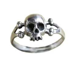 So delicate from afar people will think you're a good girl. And then they get to know you...Dimensions:  Skull measures 10mm tall.Materials: Sterling Silver: Solid sterling silverGold Plate: 14K gold plate over sterling silver10K Gold: Solid 10K gold14k Gold: Solid 14K goldIf you would like this ring in a metal or size that you don't see listed just send us an email and we can probably make it custom for you. anomalyjewelry@gmail.comAll jewelry made in N.Y.C. by my hands at the time of purchase Adjustable Skull Print Rings For Gift, Sterling Silver Skull Print Rings As Gift, Nickel-free Skull Rings For Gift, Sterling Silver Rings With Skull Print For Gift, Afar People, Pirate Accessories, Nyc Studio, Bone Jewelry, Good Girl