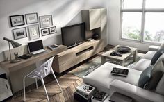 a living room filled with furniture and a flat screen tv sitting on top of a wooden table