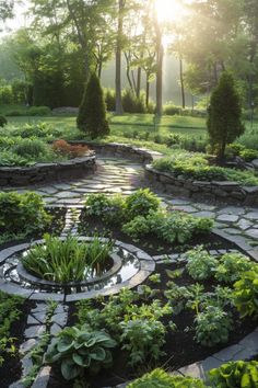 a garden with lots of plants and rocks around it, surrounded by trees in the background