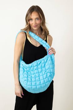 Whether for work, shopping, going to the gym, or traveling, this Large Carryall Quilted Puffer Bag for Women in Blue is the perfect accessory. Featured with a puffer quilted design and many zipper pockets, this bag is not only practical for everyday use but also super trendy and stylish! Features: Do everything in love Style: QBS320125-AQUA Color: Aqua Blue 100% Polyester Featured with fashion puffer quilted design Interior zipper pocket Zipper pocket outside side Zipper close top Lightweight W: Puffer Bag, Do Everything In Love, Color Aqua, Aqua Color, Going To The Gym, Do Everything, Bag For Women, Quilting Designs, Aqua Blue