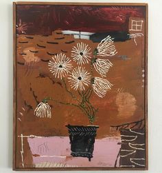 a painting with white flowers in a black vase on a brown and pink background, against a white wall