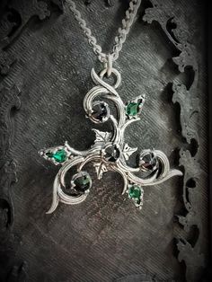 Gothic Crystal Jewelry For Gift, Silver Fantasy Jewelry For Formal Occasions, Gothic Silver Crystal Jewelry, Oxidized Silver Fantasy Jewelry, Silver Oxidized Fantasy Jewelry, Spiritual Silver Necklaces With Rhinestones, Silver Necklace With Stone Setting, Spiritual Silver Emerald Necklace, Spiritual Silver Necklace With Emerald