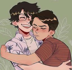 two young men hugging each other in front of plants