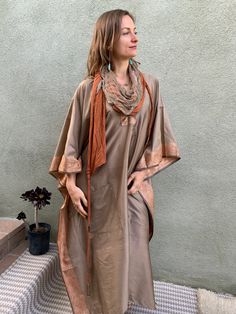 This beautiful desert shawl is a one of the kind creation. It can be worn as a headpiece, a belt, a scarf or a wrap. It comes with two detachable layers: a gauze cotton, hand-dyed by Lunara Love herself, and a stretch cotton jersey layer. This gorgeous beduin style desert scarf is lovingly hand crafted by Lunara Love of Lunara Design for our collaborative collection "Nomad Life" Being a nomad is like being a free spirit, a desert dweller who is ready to let go of the things that don't really mat Bohemian Festival Kaftan With Dupatta, Bohemian Pashmina Scarves For Spring, Bohemian Brown Silk Shawl Scarf, Brown Bohemian Silk Shawl Scarf, Spring Bohemian Pashmina Scarves, Bohemian Brown Silk Scarves, Bohemian Brown Silk Scarf, Brown Bohemian Silk Scarves, Bohemian Style One Size Scarf Wrap