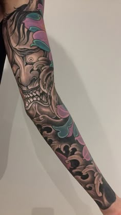 a person with a tattoo on their arm