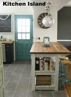 the kitchen is clean and ready to be used as a dining room or bar area