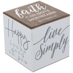 a white box with the words happy live simply written on it and a brown lid