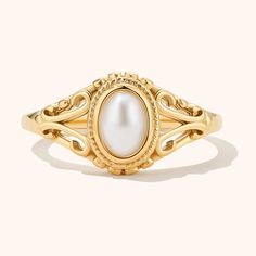 Indulge in a touch of vintage charm with our elegant Vintage Pearl Ring. Crafted with exquisite detailing, this ring features a lustrous pearl set in a classic design. This ring is perfect for those who love timeless and sophisticated pieces, making it a versatile addition to your jewelry collection Vintage Rings Pearl, Pearl Rings Vintage Sales, Classic Pearl Drop Ring, Classic Jewelry Ring With Pearl Charm, Classic Gold Pearl Ring With Pearl Charm, Dainty Pearl Ring For Formal Occasions, Elegant Yellow Gold Signet Ring, Elegant White Signet Ring For Formal Occasions, Elegant Engraved Open Ring