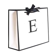 a black and white shopping bag with the letter e on it's front side