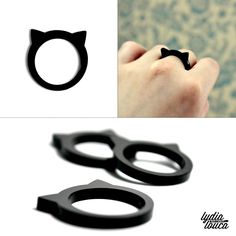 two images with black rings and cat ears on them