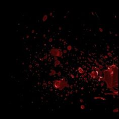 red blood splattered on black background