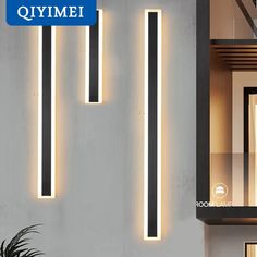 modern led wall light with dimmers on the side of a building in front of a window