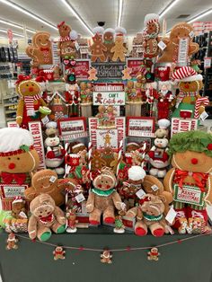 a christmas display in a store filled with lots of gingerbreads