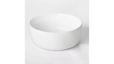 a white bowl sitting on top of a table