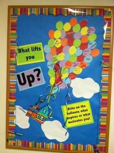 a bulletin board with the words what lifts you up? and balloons in the sky