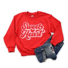 Looking for a cute sweatshirt for your kids? We have the perfect Sweet Heart With Heart graphic sweatshirt addition to their closet! Also available in toddler sweatshirts. Playful Red Cotton Sweatshirt, Sweet Red Crew Neck Top, Red Sweet Crew Neck T-shirt, Playful Red Sweatshirt For Fall, Sweet Style Red Crew Neck T-shirt, Red Long Sleeve Sweatshirt For Valentine's Day, Cute Red Crew Neck Sweater, Red Sweatshirt For School In Fall, Cute Red Long Sleeve Sweatshirt