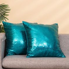 PRICES MAY VARY. Decorative sequin pillow case is made of satin silk fabric. 3mm sequins are densely and evenly sewed on the front side while the other side is a whole piece of silk fabric. 2 packs, 18 inches by 18 inches in size， pillow cases only. It is a glamorous decor for your couch sofa bed and love seats. This sequin pillow cases can be really shiny in the light. It can brighten up your room. Tiny sequins make the pillow cases look more elegant. Exquisite workmanship. Neat stitches make t Teal Throw Pillows, Glamorous Decor, Moroccan Living Room, Silk Throw Pillows, Sequin Pillow, Couch Throw, Eternal Beauty, Couch Throws, Living Room Set