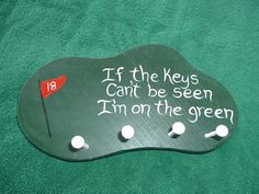 a golf putter's stone with the words if the keys can't be seen i'm on the green