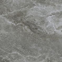 a close up view of a gray marble surface