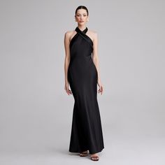 This Criss Cross Halter Satin Maxi Dress is the perfect blend of sophistication and daring. The elegant criss-cross halter strap wraps around the neck for a luxurious touch, while the eye-catching satin material creates an unmistakable silhouette. Experience the softness and effortless glamour of this exclusive dress. Exclusive Dress, Halter Strap, Satin Maxi, Satin Maxi Dress, Satin Material, Dresses Xs, Criss Cross, Ootd, Maxi Dress