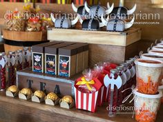 a table topped with lots of candy and treats