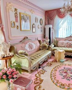 a pink and gold living room with fancy furniture