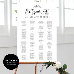 the seating chart for a wedding ceremony is displayed on an easel with flowers and greenery