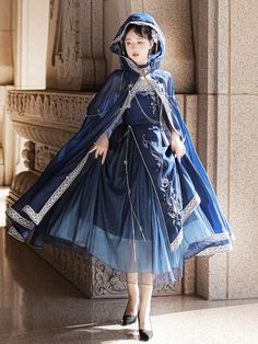 Mystery butterfly fairy cloak. Constract silver white lace trim, starry night deep blue cloak, decorated with a pair of butterfly charm chains.    	 		 			Size 			S 			M 			L 		 		 			Full Length 			110 			112 			114 Womens Cosplay, Style Kawaii, Jumper Skirt, Hooded Cloak, Sling Dress, Dress Suits, Kawaii Fashion, Cloak, Elegant Dress