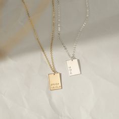 When it comes to tag necklaces, our Amy tag necklace is the perfect fit. Personalize it with a strong meaning, names, dates, or encouraging words. Each tag is handmade and hand-stamped by our team. P R O D U C T * D E T A I L S - Tag measures 15x10mm - Satin finish - Available in Sterling Silver, 14k Gold Filled, and 14K Rose Gold Filled H O W * T O * O R D E R Step 1: Use the first drop-down menu to select your necklace length and material Step 2: Use the second drop-down menu to select your al Personalized Rectangular Jewelry For Best Friend Gift, Engraved Rectangular Jewelry For Best Friend, Father's Day Gift Necklace With Rectangular Pendant, Stamped Rectangular Pendant Necklace For Gift, Encouraging Words, Necklace Initial, Necklace Simple, Monogram Necklace, Personalized Tags