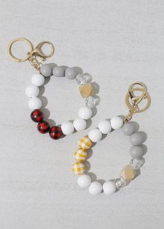 durable keychain bracelet for an easy access to your keys consists of 3 plaid wood beads that comes in different colors includes keyring and claw clasp Bead Keychain, Keychain Bracelet, Beaded Keychains, Rings Bracelets, Trendy Jewelry, Earrings Rings, Guinea Bissau, Wood Beads, Silver Bracelets