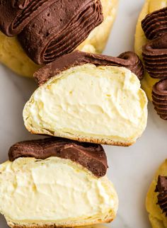 chocolate and cream filled pastries on a white plate