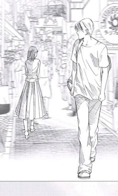 an image of a man and woman walking down the street