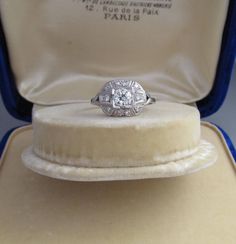 an antique diamond ring in a velvet case