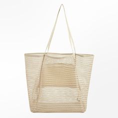 Embrace the carefree spirit of summer with our Breezy Mesh Beach Tote. Designed to be your stylish companion for sun-soaked days, this tote effortlessly combines fashion and functionality. Crafted from lightweight mesh material in a versatile neutral hue, it offers a breathable and airy feel, perfect for carrying your beach essentials while keeping everything sand-free. Product code: CAC12F4E003GG Packable Beige Shoulder Bag For Summer, Trendy Mesh Bag For Daily Use, Trendy Cream Beach Bag For Beach Season, Chic Lightweight Beige Beach Bag, Casual Mesh Tote Bag, Daily Use Mesh Shoulder Bag, Cream Beach Bag For Daily Use, Cream Beach Bag With Large Capacity, Chic Lightweight Shoulder Bag For Beach Season