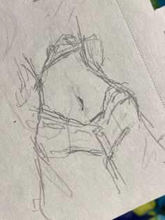 a pencil drawing of a woman's torso on top of a piece of paper