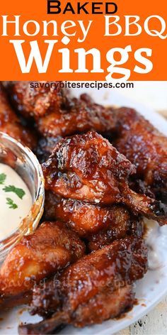 baked honey bbq wings on a plate with ranch dressing