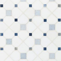 a white and blue tiled wall with small squares