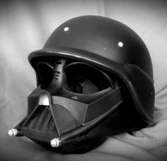 a star wars helmet is shown in black and white