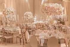 an image of a banquet room setting with flowers